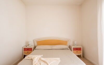 Appartamento Gabbiano: Furniture, Bedroom, Bed, Wood, Bed Sheet, Interior Design, Floor, Bedding, Flooring, Room