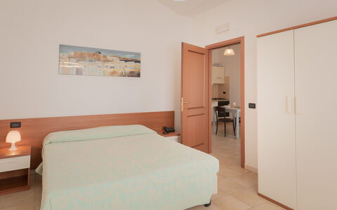 Le Fontane Apartments In Villasimius: Interior Design, Furniture, Floor, Flooring, Ceiling, Room, Bedroom, Bed, Apartment, Chair