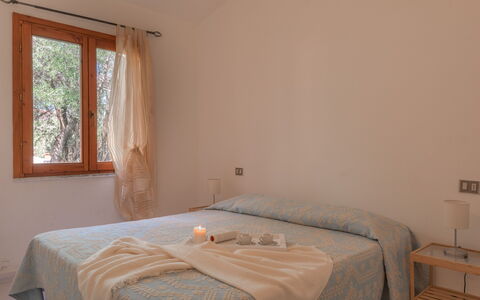 San Teodoro Apartments: Interior Design, Wood, Bedroom, Floor, Flooring, Furniture, Bed, Textile, Bed Sheet, Ceiling