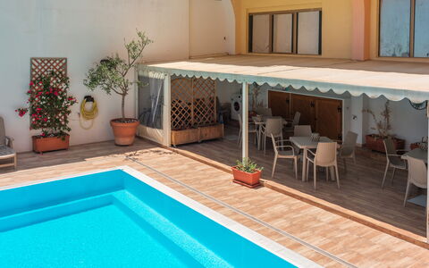 Cristal Blu Apartments In Santa Teresa Gallura: Swimming Pool, Floor, Flooring, Furniture, Composite Material, Resort, Outdoor Furniture, Shade, Leisure, Eco Hotel