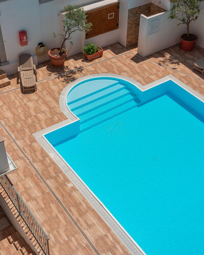 Cristal Blu Apartments In Santa Teresa Gallura: Swimming Pool, Composite Material, Resort, Thermae, Tile, Water Feature, Hacienda, Design, Hotel, Courtyard