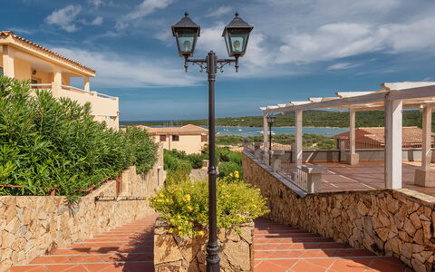Golfo Aranci Apartments With Ac: Residential Area, Town, Estate, Resort, Balcony, Eco Hotel, Shade, Villa, Hacienda, Landscaping