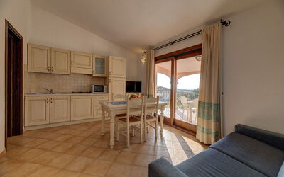 Appartamento Vela: Furniture, Flooring, Interior Design, Floor, Ceiling, Room, Kitchen, Apartment, Kitchen & Dining Room Table, Wood Stain