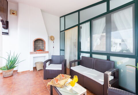 Appartamento Lido Specchiolla: Furniture, Interior Design, Flooring, Floor, Ceiling, Room, Chair, Living Room, Wood Stain