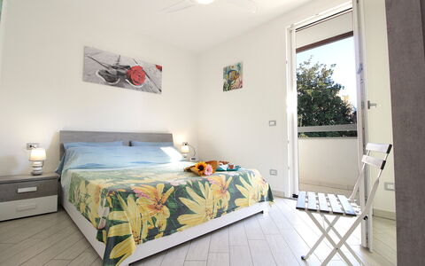 Villetta Elena, Ac, Wifi, Lido Degli Scacchi: Interior Design, Furniture, Floor, Apartment, Flooring, Bedroom, Room, Home, Bed, Bed Sheet