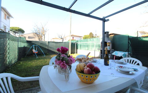 Villetta Elena, Ac, Wifi, Lido Degli Scacchi: Furniture, Chair, Outdoor Furniture, Shade, Outdoor Table, Backyard, Flowerpot, Garden, Outdoor Structure, Houseplant