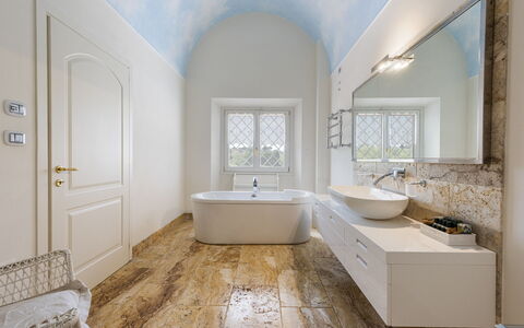 Villa Yvonne: Flooring, Wall, Floor, Interior Design, Ceiling, Plumbing Fixture, Bathroom, Lighting, Tile