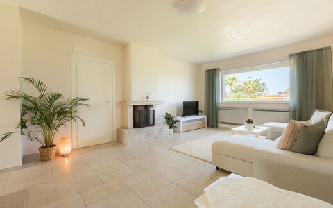 Villa Pallino: Flooring, Floor, Interior Design, Ceiling, Furniture, Couch, Living Room, Lighting, Home, Room