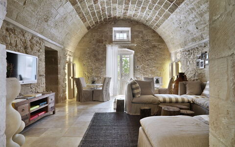 Masseria Capasa: Furniture, Wall, Interior Design, Flooring, Couch, Ceiling, Floor, Living Room, Lighting, Chair