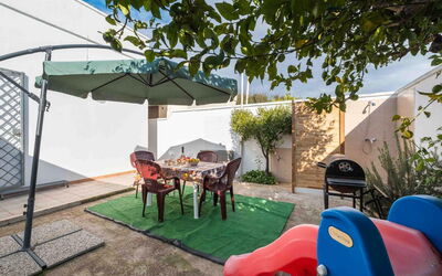 Sunny Haven Villa In Torre Lapillo: Garden, Shade, Flowerpot, Outdoor Furniture, Yard, Backyard, Landscaping, Courtyard, Chair, Houseplant