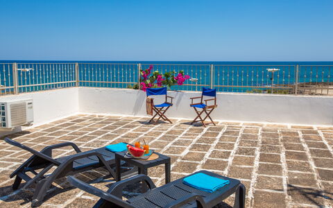 Vista Mare Da Rossella: Blue, Furniture, Floor, Flooring, Chair, Table, Sea, Ocean, Outdoor Furniture, Resort