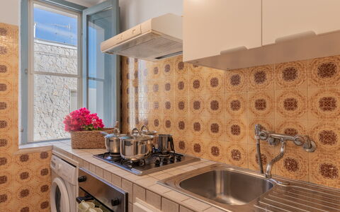 Casa Olimpo: Major Appliance, Kitchen Appliance, Kitchen, Flooring, Interior Design, Countertop, Floor, Kitchen Stove, Plumbing Fixture, Room