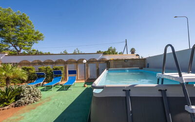 Sea Coral Apartment In Porto Cesareo: Blue, Swimming Pool, Composite Material, Shade, Resort, Eco Hotel, Hotel, Houseplant, Outdoor Furniture