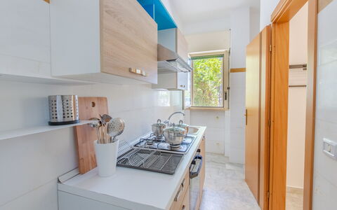 Villa Asami: Kitchen, Major Appliance, Countertop, Wood, Flooring, Kitchen Appliance, Interior Design, Floor, Cabinetry, Kitchen Sink