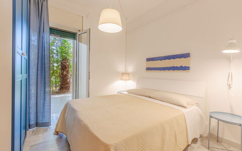 Villa Asami: Interior Design, Floor, Flooring, Ceiling, Room, Apartment, Bedroom, Bed, Window Treatment, Bedding