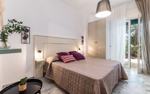 Villa Coralia: Interior Design, Furniture, Flooring, Ceiling, Bedroom, Textile, Floor, Room, Home, Bed