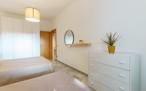 Villa Nami: Flooring, Interior Design, Wall, Wood, Floor, Furniture, Ceiling, Bed, Bedroom, Lighting