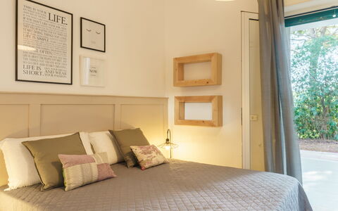 Villa Nami: Bed, Furniture, Interior Design, Bedroom, Bedding, Wall, Bed Sheet, Wood, Room, Ceiling
