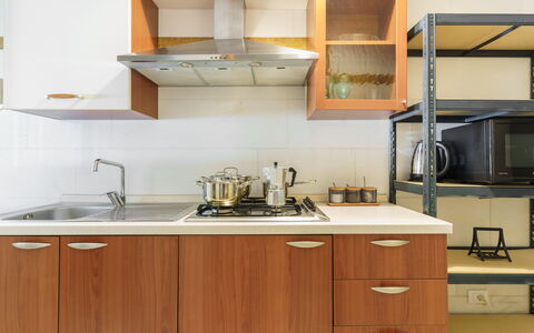 Villa Nami: Kitchen Appliance, Kitchen, Countertop, Major Appliance, Cabinetry, Kitchen Stove, Stove, Gas Stove, Wood, Kitchen Sink