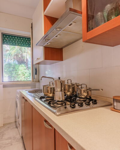Villa Nami: Kitchen, Kitchen Appliance, Countertop, Major Appliance, Wood, Flooring, Interior Design, Kitchen Sink, Floor, Cabinetry