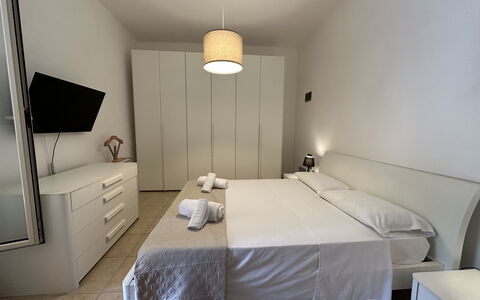 Villa Azzurra: Bed, Interior Design, Bedroom, Furniture, Flooring, Floor, Bedding, Bed Sheet, Textile, Ceiling