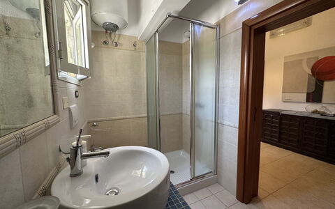 Villa Azzurra: Flooring, Floor, Interior Design, Plumbing Fixture, Bathroom, Wood, Sink, Furniture, Bathroom Sink, Tap