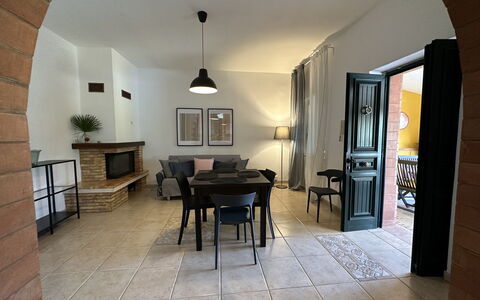Villa Azzurra: Furniture, Flooring, Floor, Interior Design, Chair, Lighting, Ceiling, Table, Room, Living Room