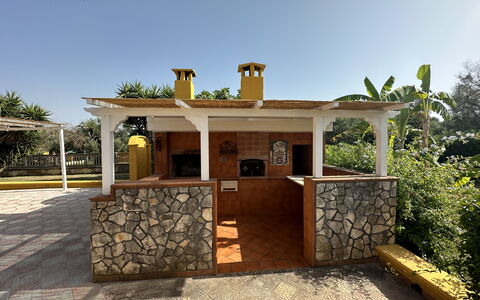 Villa Azzurra: Shade, Outdoor Structure, Wood Stain, Backyard, Column, Outdoor Furniture, Resort, Outdoor Table, Pergola, Porch