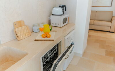 Casa Lea: Interior Design, Flooring, Countertop, Floor, Room, Kitchen, Home Appliance, Cabinetry, Kitchen Appliance, Tile