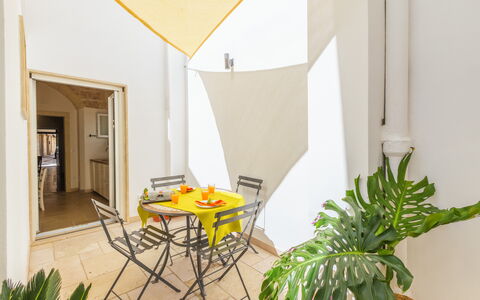Dimora Storica: Furniture, Interior Design, Chair, Ceiling, Shade, Wood Stain, Houseplant, Kitchen & Dining Room Table, Outdoor Furniture, Eco Hotel