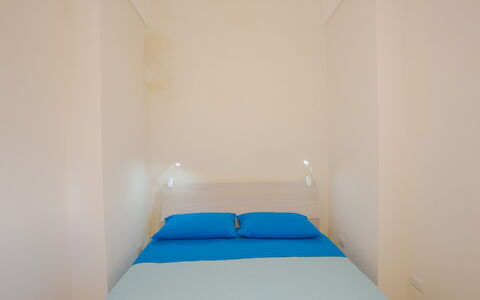 Casa Ettore: Floor, Interior Design, Flooring, Room, Bedroom, Apartment, Bed, Bed Sheet, Ceiling, Bedding