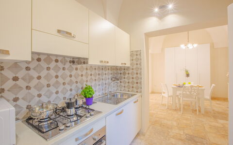 Casa Ettore: Interior Design, Flooring, Floor, Ceiling, Countertop, Kitchen, Room, Major Appliance, Lighting, Kitchen Appliance