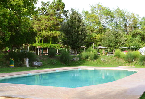 Appartamento La Torretta Di Pietra, Wifi, Perugia: Swimming Pool, Tree, Resort, Shade, Garden, Outdoor Furniture, Leisure, Backyard, Landscaping, Water Feature