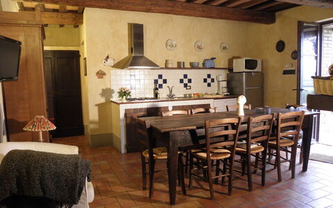 Appartamento Pietra Viva, Wifi, Near Perugia: Furniture, Interior Design, Flooring, Wood, Floor, Table, Ceiling, Kitchen & Dining Room Table, Chair, Kitchen