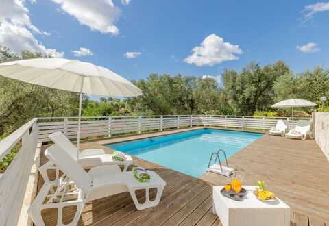 Trullo Quattro Carrini: Furniture, Outdoor Furniture, Resort, Swimming Pool, Eco Hotel, Sunlounger, Chair, Shade, Hotel, Villa