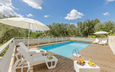 Trullo Quattro Carrini: Furniture, Outdoor Furniture, Resort, Swimming Pool, Eco Hotel, Sunlounger, Chair, Shade, Hotel, Villa