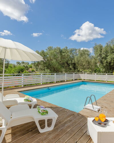 Trullo Quattro Carrini: Furniture, Outdoor Furniture, Resort, Swimming Pool, Eco Hotel, Sunlounger, Chair, Shade, Hotel, Villa
