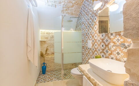 Lamia Del Vespro: Flooring, Plumbing Fixture, Interior Design, Bathroom, Floor, Toilet, Plumbing, Ceiling, Tile, Toilet Seat