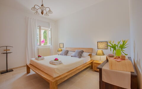Villa Vera: Furniture, Bed, Interior Design, Flooring, Floor, Bedroom, Wood, Room, Bed Sheet, Bedding