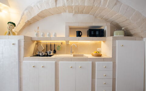 Casa Tosca: Interior Design, Furniture, Flooring, Kitchen, Lighting, Countertop, Ceiling, Floor, Cabinetry, Kitchen Appliance