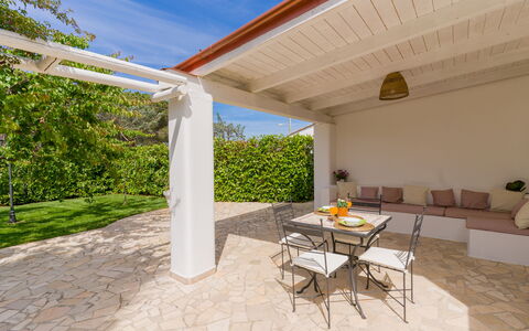 Ville Poggioreale: Flooring, Furniture, Floor, Ceiling, Outdoor Furniture, Shade, Chair, Porch, Outdoor Structure, Eco Hotel