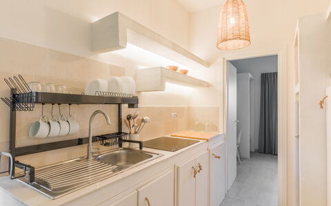 Ville Poggioreale: Interior Design, Countertop, Wood, Kitchen, Flooring, Furniture, Cabinetry, Floor, Lighting, Home