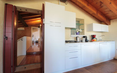 Silea Apartments, Pool, Garden, Treviso: Interior Design, Flooring, Wood, Floor, Ceiling, Furniture, Room, Home, Cabinetry, Kitchen