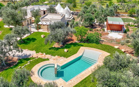 Trulli Corte Kalia, Golf & Puglia: Tree, Shrub, Landscape, Garden, Landscaping, Estate, Dome, Yard, Lawn, Backyard