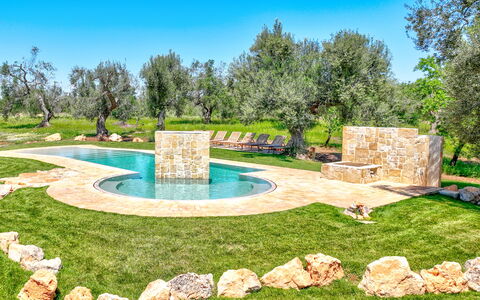 Trulli Corte Kalia, Golf & Puglia: Garden, Landscaping, Water Feature, Lawn, Backyard, Yard, Swimming Pool, Shade, Park, Botanical Garden
