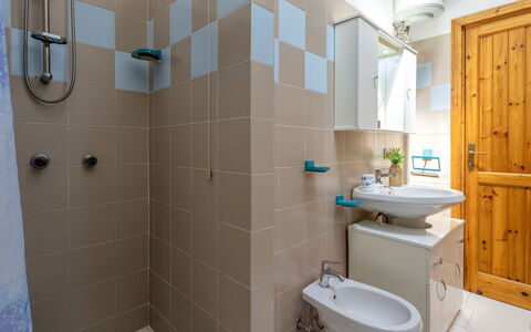 Badesi 10: Bathroom, Plumbing Fixture, Flooring, Sink, Bathroom Sink, Interior Design, Floor, Toilet, Tap, Toilet Seat