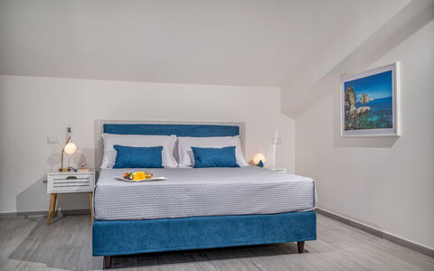 Attico Sea View: Furniture, Interior Design, Bed, Bedroom, Flooring, Floor, Bedding, Bed Sheet, Wood, Room