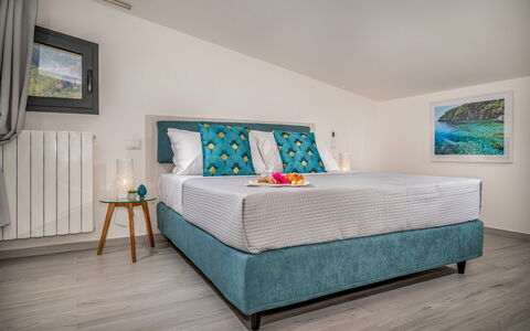 Attico Sea View: Furniture, Bed, Interior Design, Bedroom, Bedding, Floor, Flooring, Bed Sheet, Room, Linens