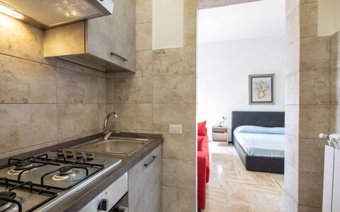Gallipoli Apartment Ac, Seaside: Flooring, Interior Design, Floor, Furniture, Ceiling, Room, Home, Apartment, Kitchen, Cabinetry