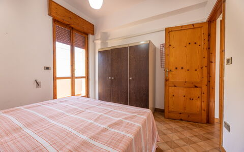 Giovanni Apartment In Gallipoli, Ac, Seaside: Bed, Bedroom, Wood, Interior Design, Bed Sheet, Bedding, Floor, Apartment, Flooring, Room